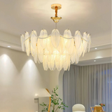 Glass feather chandelier illuminated in a living room