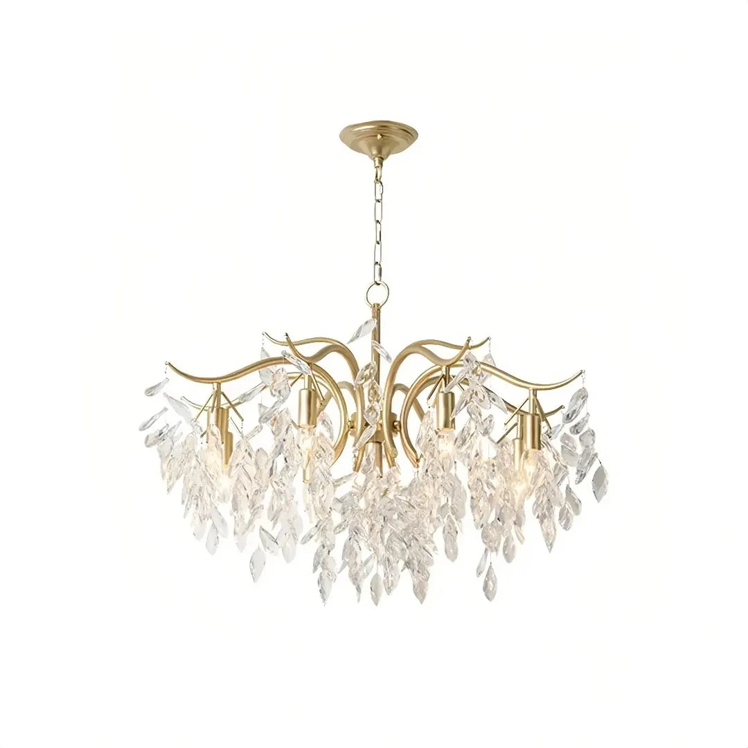  Close-up of textured crystal leaves on a gold chandelier  