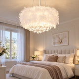 Feather chandelier casting soft decorative light 