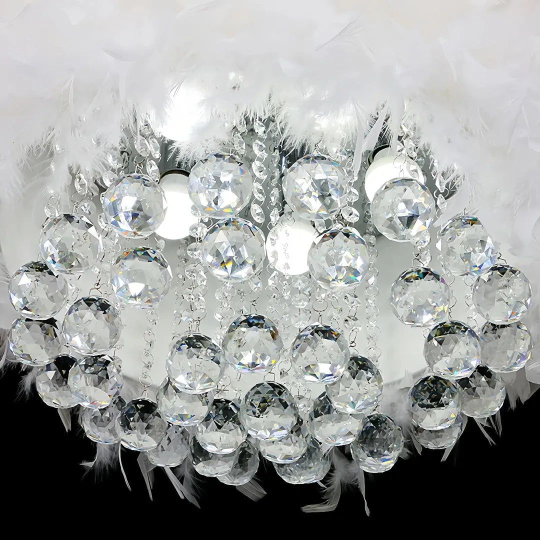  Crystal pendants on a feather chandelier   