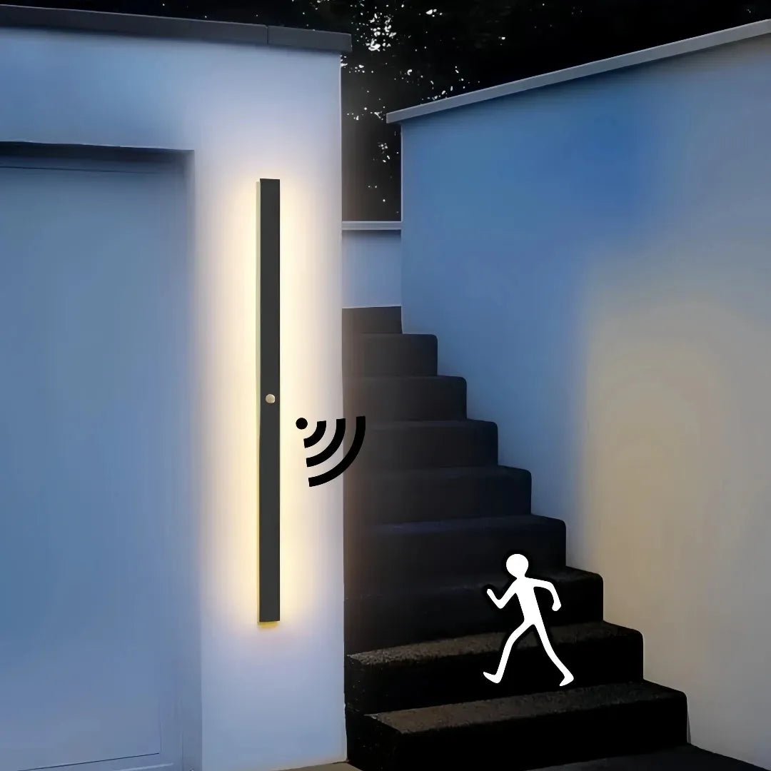 Black linear outdoor wall light with integrated LED