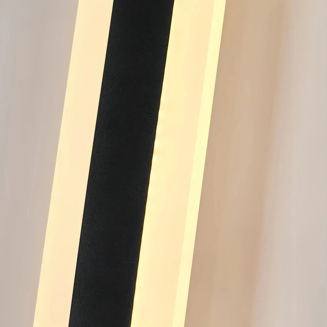 Close-up of the black metal body of the outdoor wall light