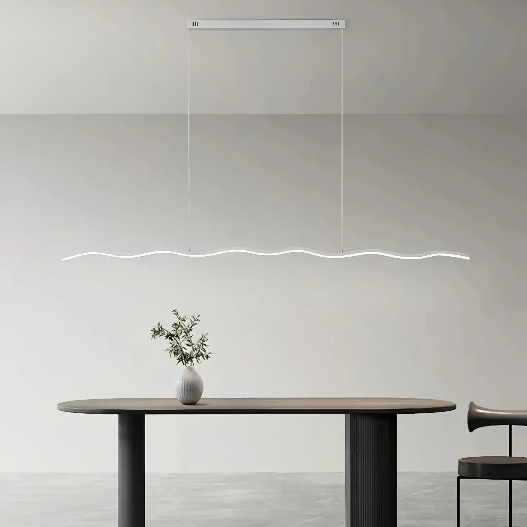 White wave pendant light in a minimalist living room
