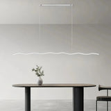 White wave pendant light in a minimalist living room