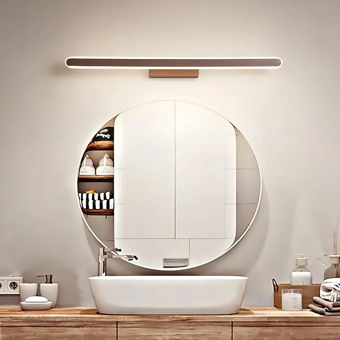 modern LED bathroom mirror light above a vanity mirror