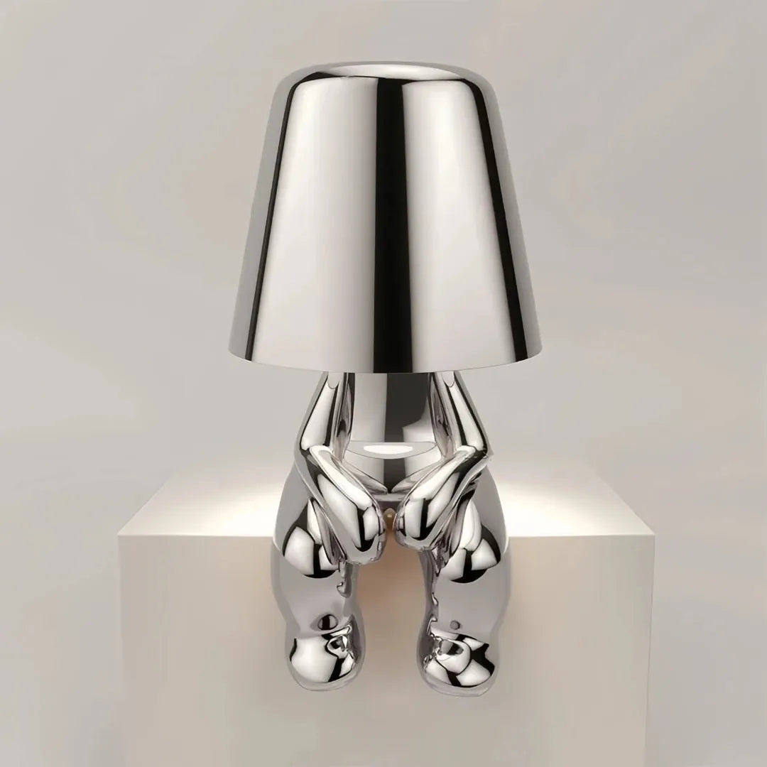 Silver sculptural bedside table lamp for modern bedrooms