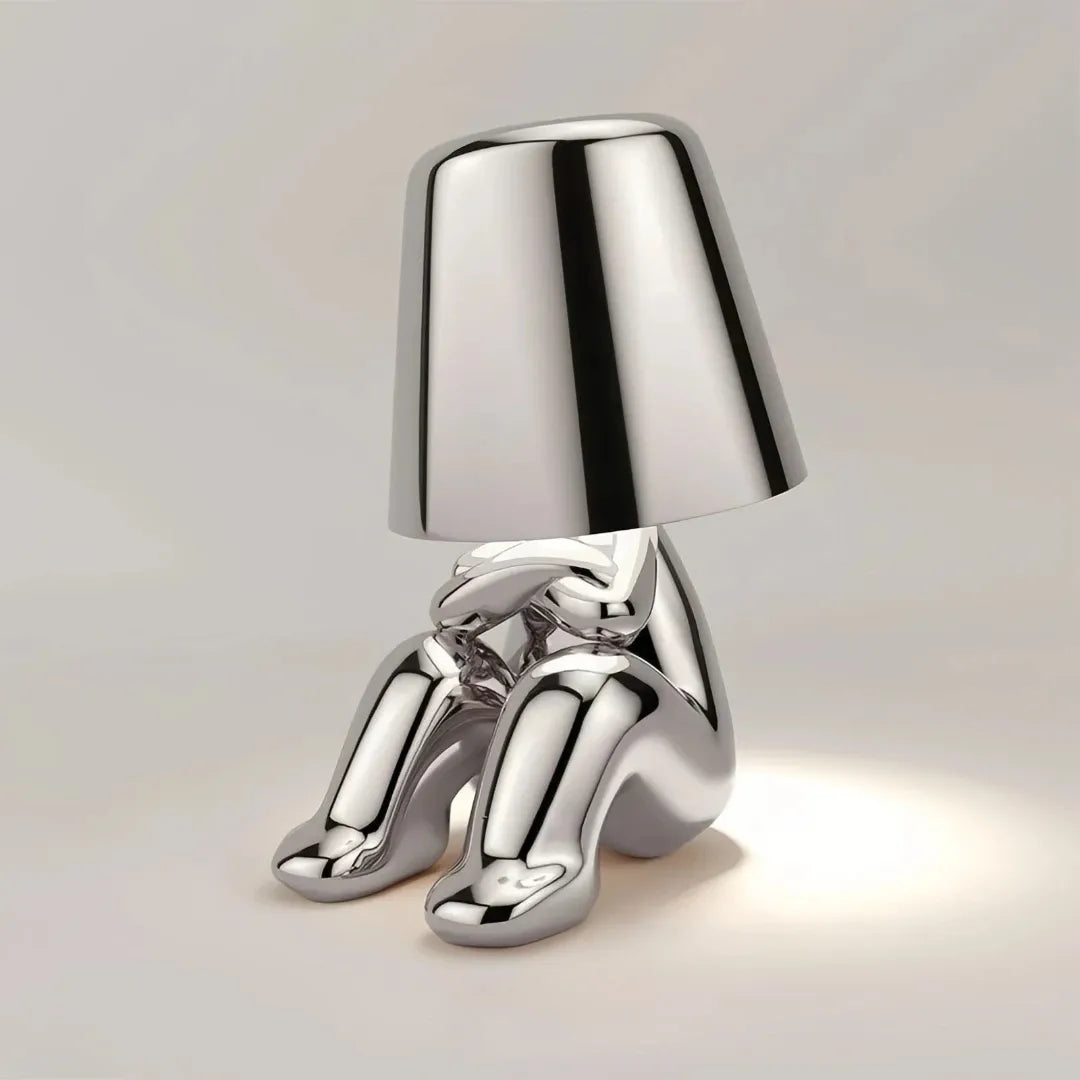 Silver sculptural bedside table lamp for modern bedrooms