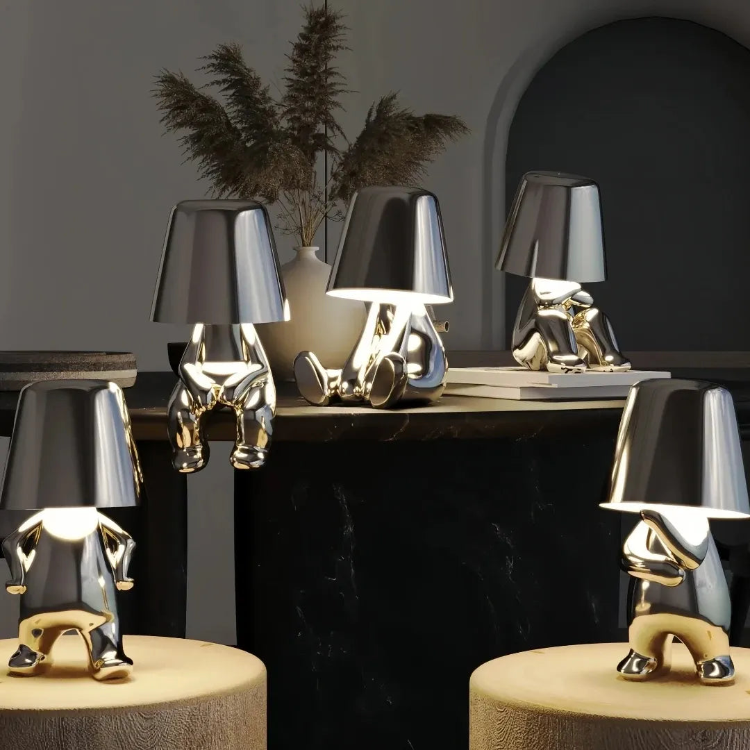 Silver sculptural bedside table lamp for modern bedrooms