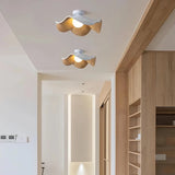 Modern lotus leaf ceiling light installed in an indoor hallway