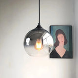 Modern glass globe pendant light in a silver finish