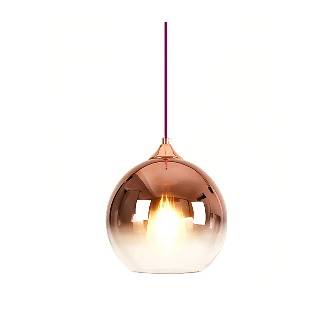 Modern glass globe pendant light in a gold finish