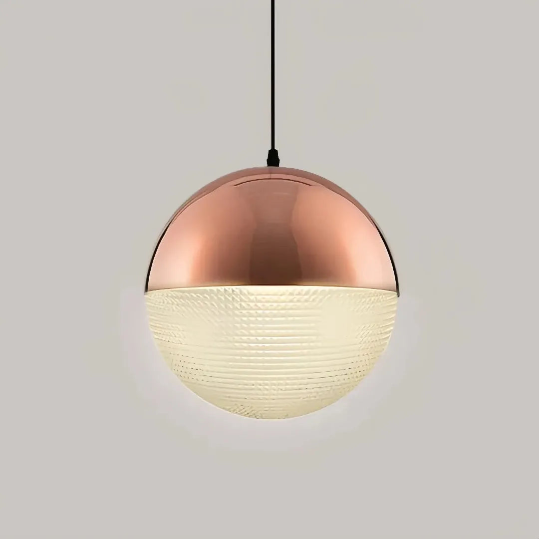 Rose gold pendant light with clear patterned glass shade