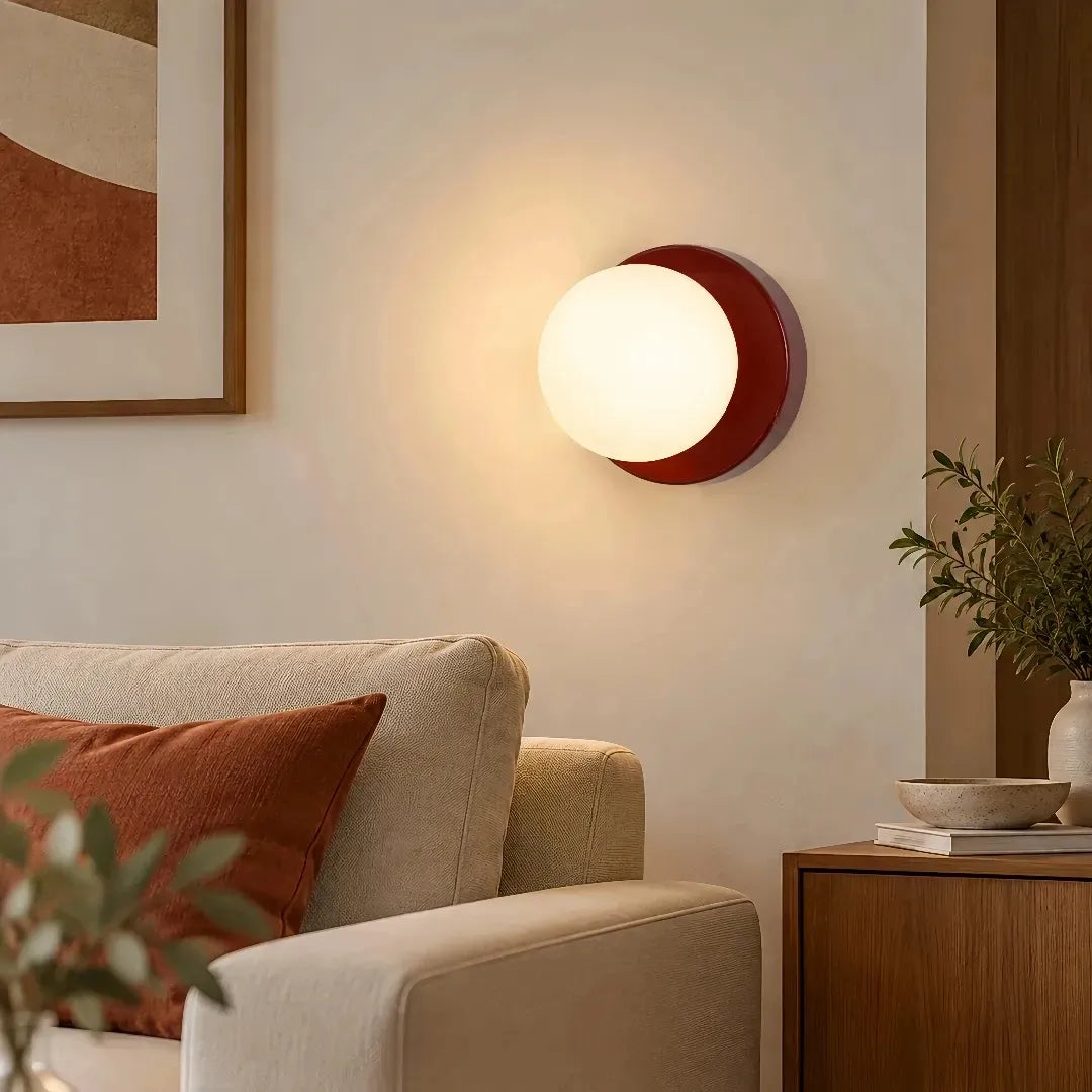 Modern glass globe wall light in black finish