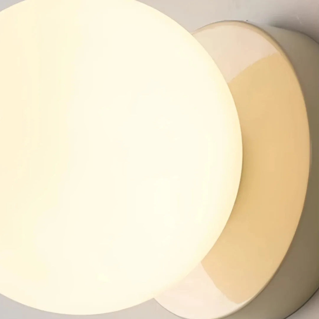Side view of the white glass globe wall light