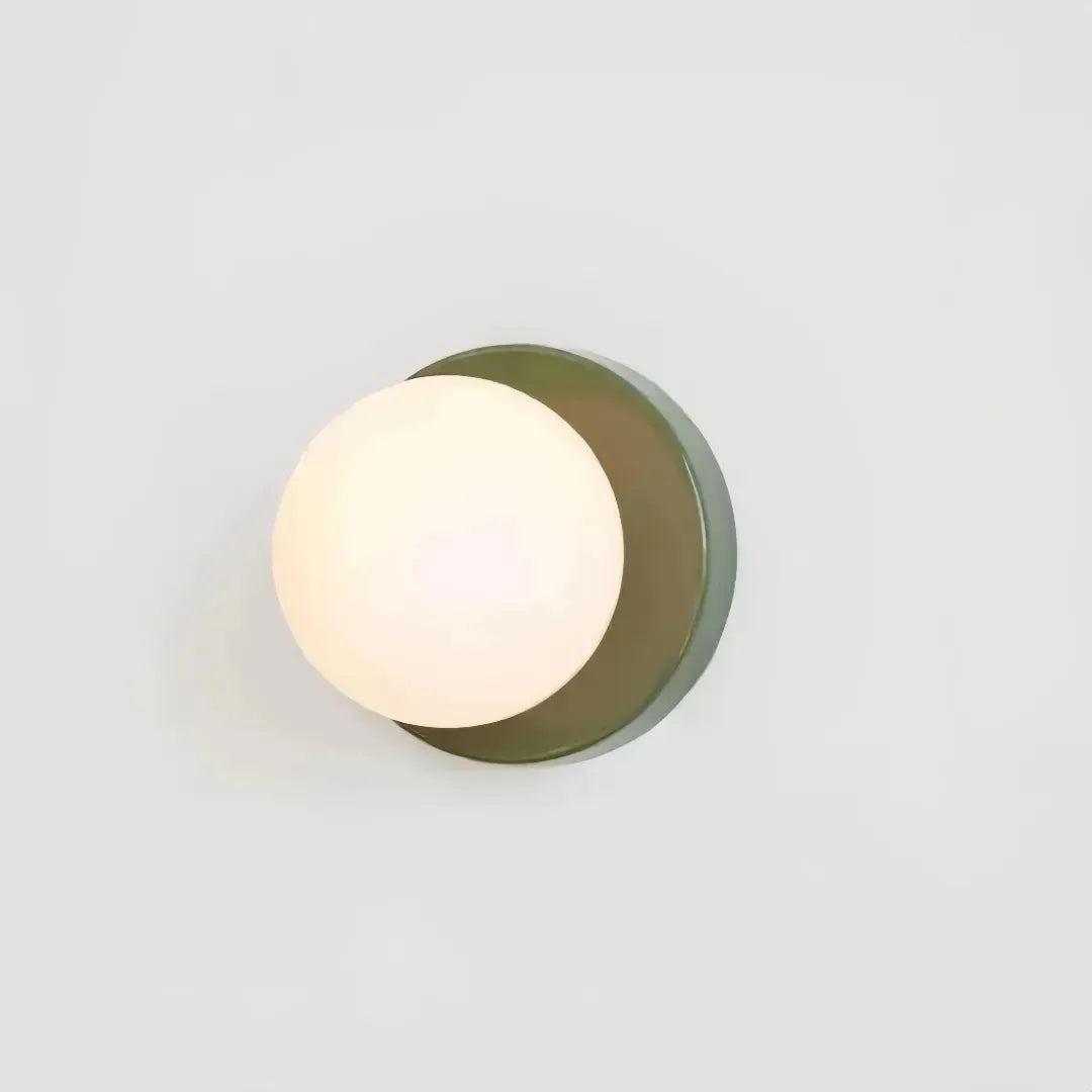 Side view of the grun glass globe wall light