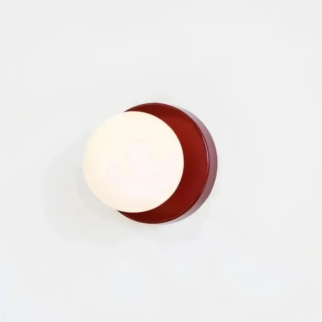 Modern glass globe wall light in red finish