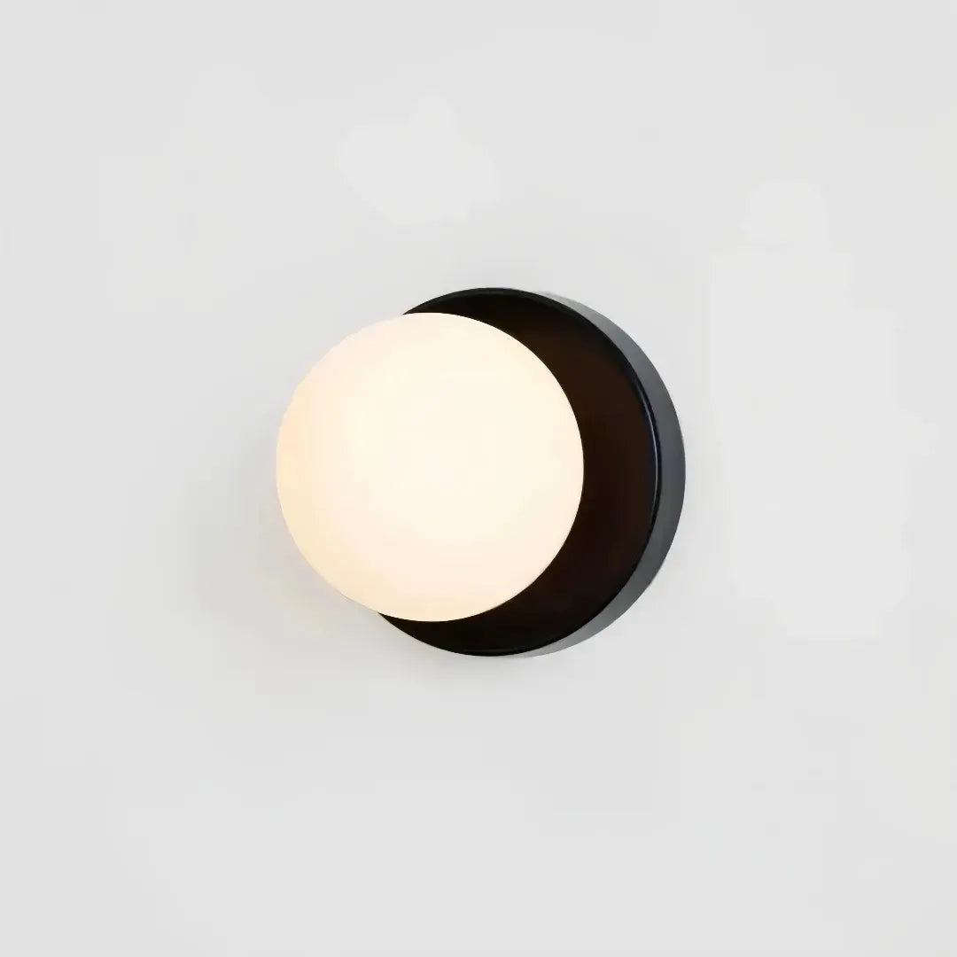 Side view of the black glass globe wall light