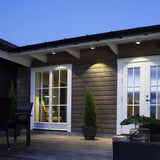 Surface-mounted outdoor ceiling light installed on a covered balcony