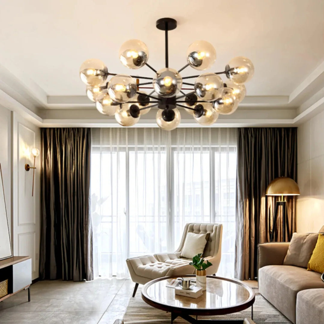 Black 16-light chandelier with amber glass globes in a living room