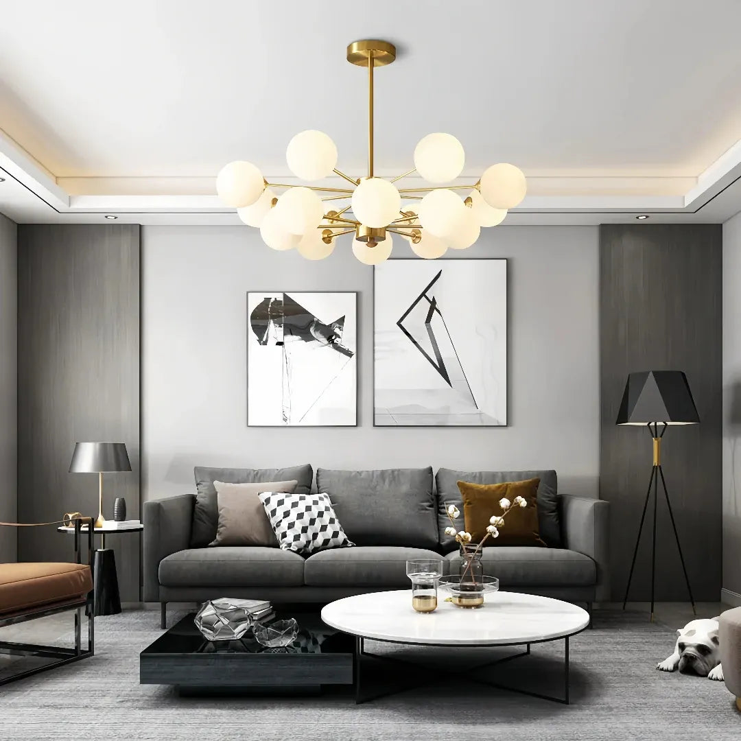 Gold 16-light Sputnik chandelier above a living room seating area