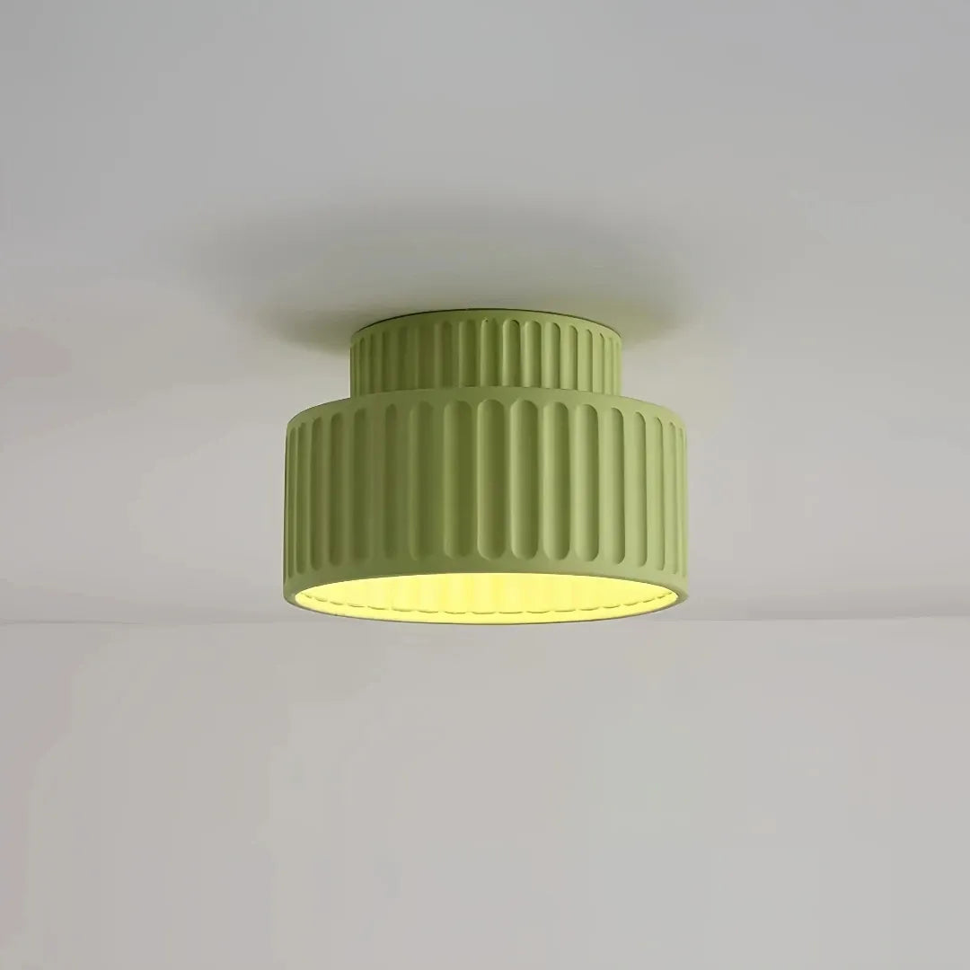 Cream flush ceiling light mounted close to the ceiling