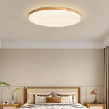 Round wooden flush ceiling light with acrylic diffuser