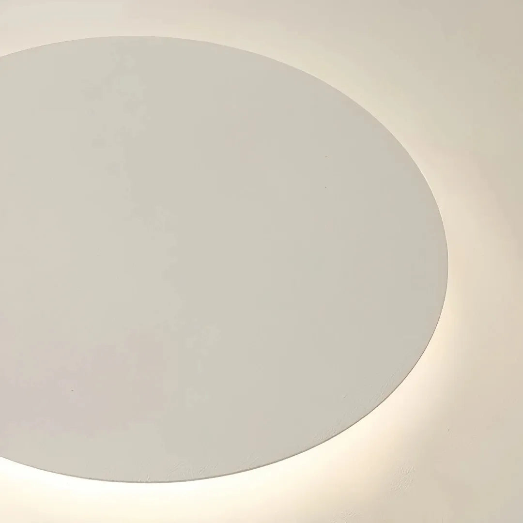 Close-up of acrylic shade on cream LED ceiling light 
