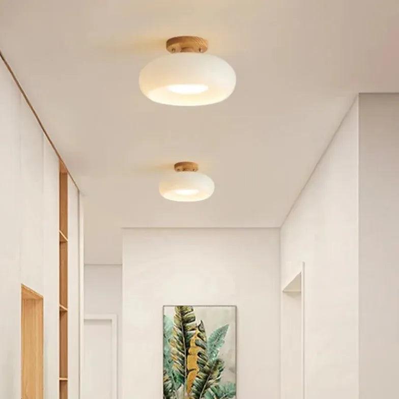 Elliptical Glass Corridor with Recessed Ceiling Lights - Clowas